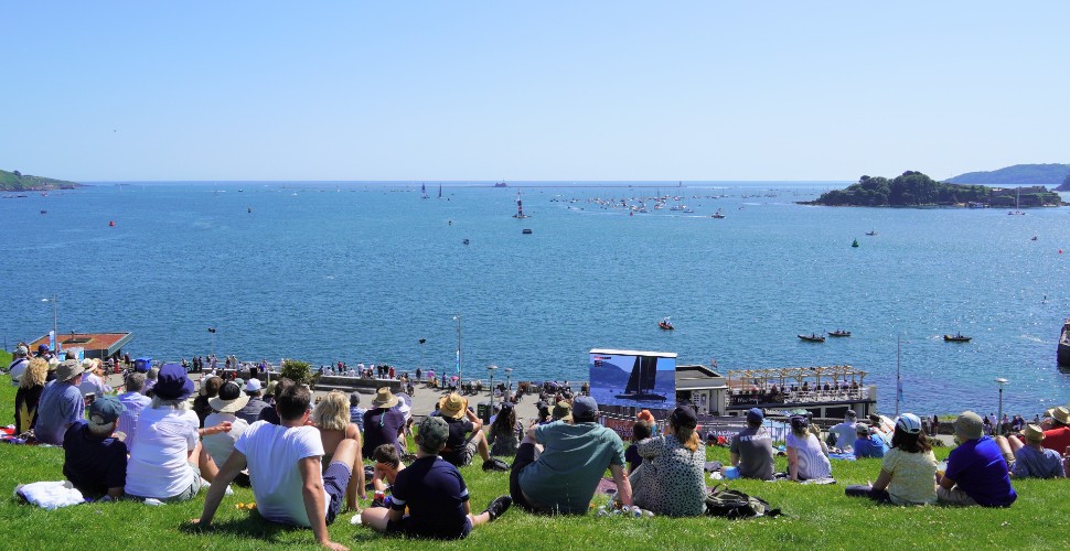 Crowds of people watching SailGP from Plymouth Hoe